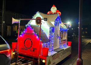 Santa riding on the float in Aylesbury